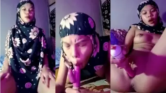 Naughty Hijabi Anggi Fingering Her Wet Pussy In The Bedroom