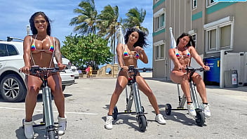 Thick Latina Babes Ride Electric Trikes On The Beach, Jiggling Their Juicy Booties