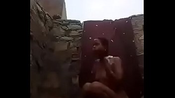 Desi Bhabhi’s Steamy Nude Bath