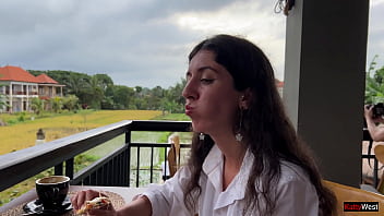 Feasting On Pizza With A Fresh Glaze In A Crowded Cafe