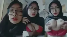 Nadira’s Black Hijab, Red Bra Tease