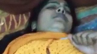 Desi Aunty In Yellow Sari Gets Intimate On Camera