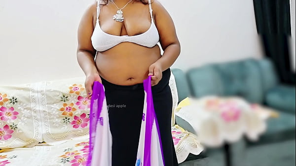 Indian Bhabhi Flaunting Her Curves In A Tight, Wet Saree, Teasing With Every Step